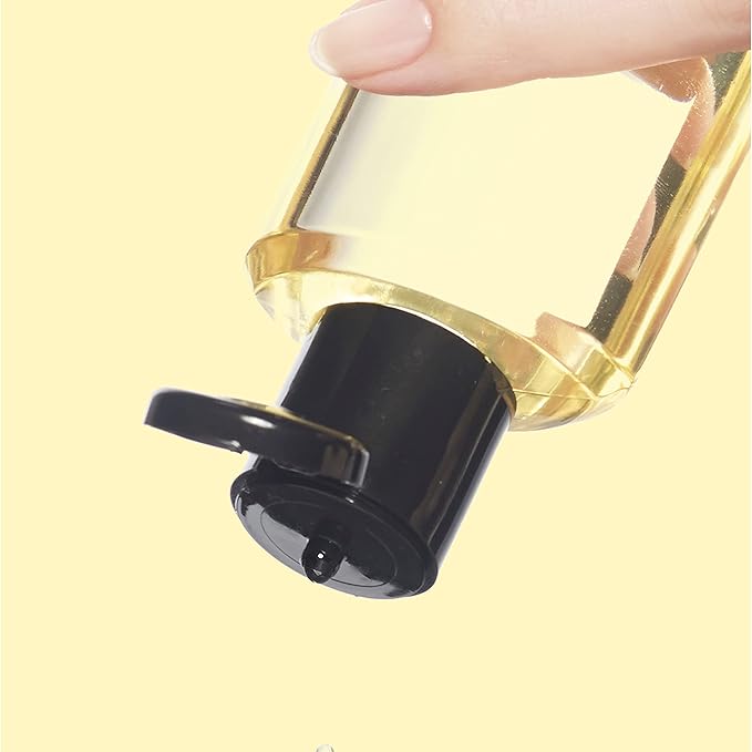 Neutrogena Body Oil Light Sesame Formula, 16 fl oz, Radiant Glow Moisturizer for Dry Skin, Bath & Shower Oil For Smooth and Hydrated Skin